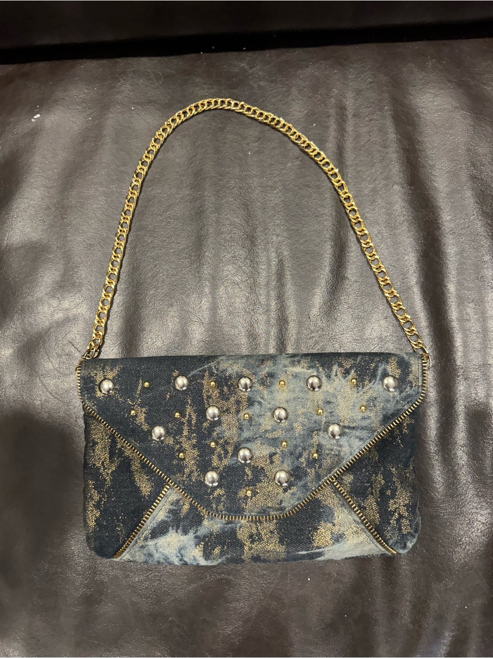 Gold-Accent Acid Wash Denim Shoulder Bag with studs & gold tone chain